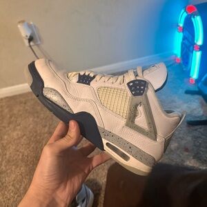 Nike Air Jordan 4 Retro White and Navy Sneakers